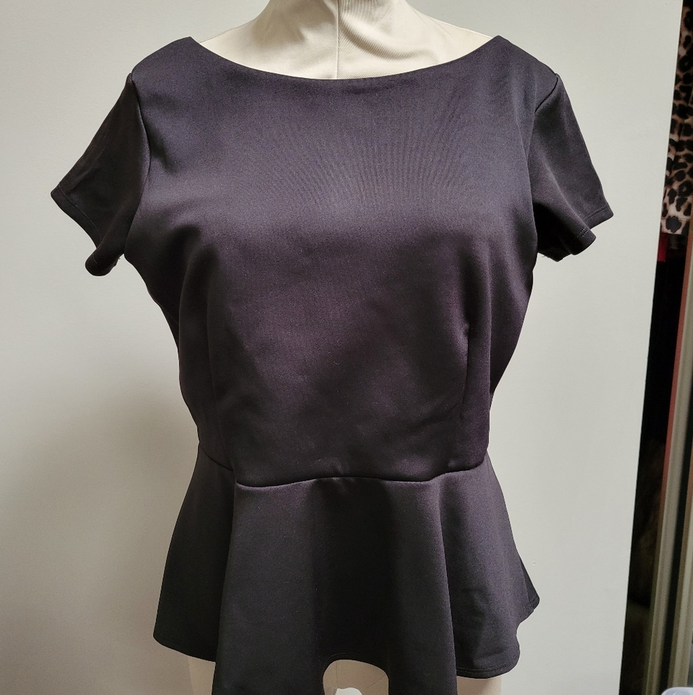 Peplum Bisou Bisou top in Black.